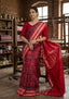 Handwoven Charcoal Black Sambalpuri Patta Silk Saree with Peacock Tribal Motifs