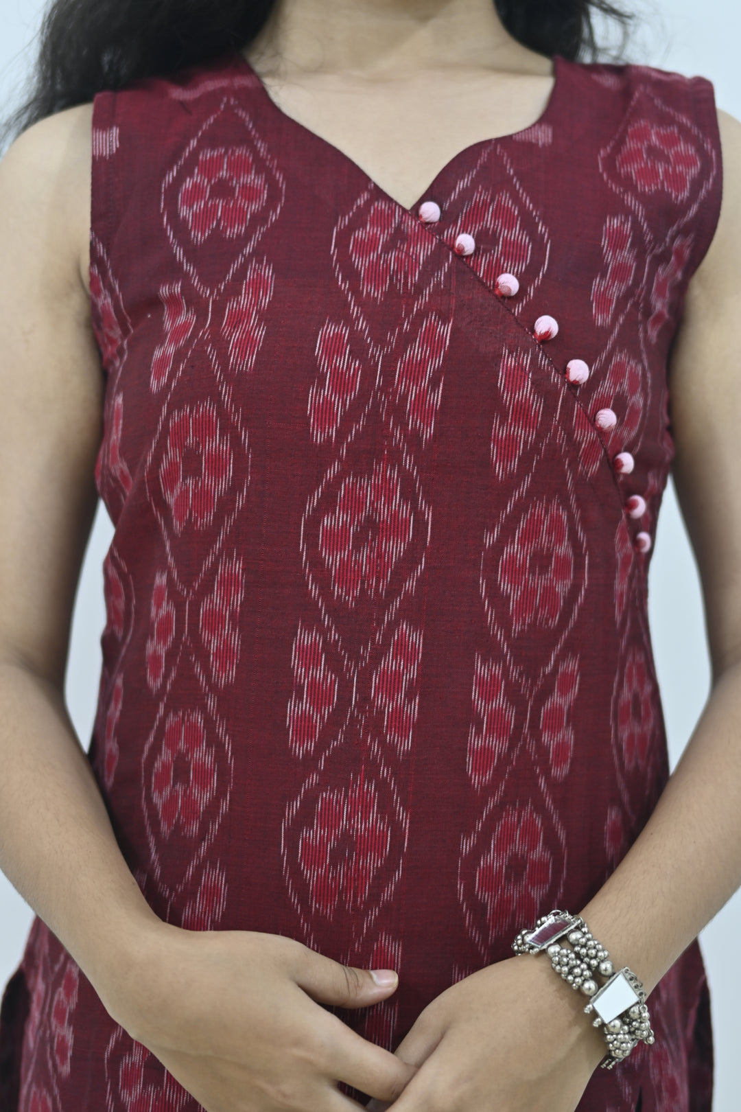 Wovio Modern Ikat Dress - Sleeveless Maroon Base with Wavy Motif & Button Accent