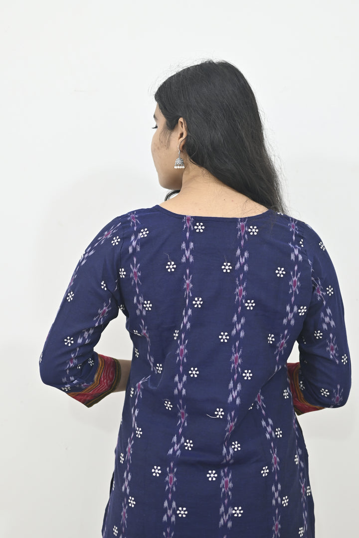 Wovio Modern Ikat Fusion Top D Neck – Blue Base with Mini Dot Motifs & Red–Black