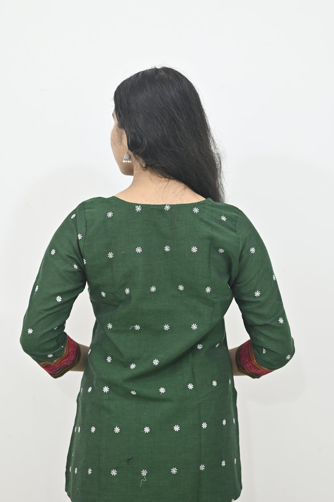 Wovio Modern Ikat Fusion Top D Neck – Green Base with Mini Dot Motifs & Red–Black