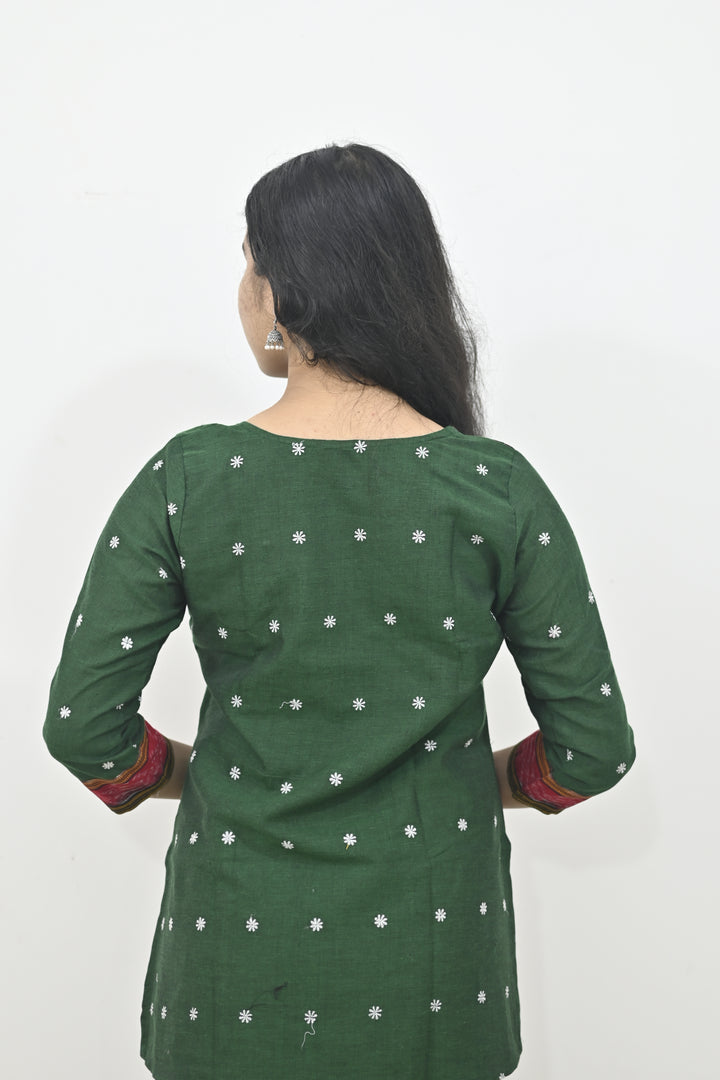 Wovio Modern Ikat Fusion Top D Neck – Green Base with Mini Dot Motifs & Red–Black