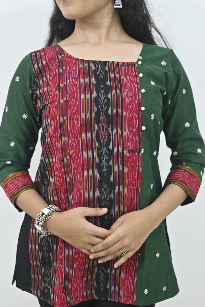 Wovio Modern Ikat Fusion Top D Neck – Green Base with Mini Dot Motifs & Red–Black